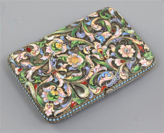 A late 19th/early 20th century Russian 84 zolotnik silver gilt and champleve enamel cigarette case, 4.25in.